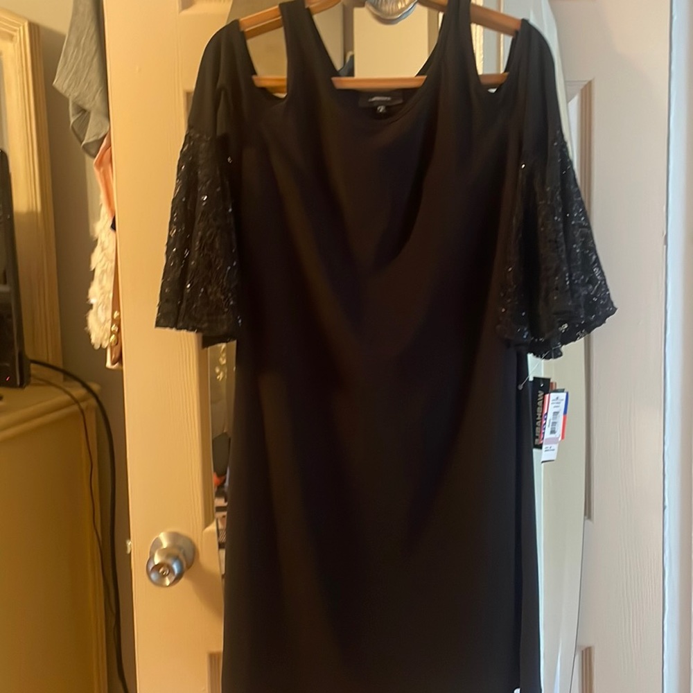 Cold shoulder black dress with bell sequins sleeves